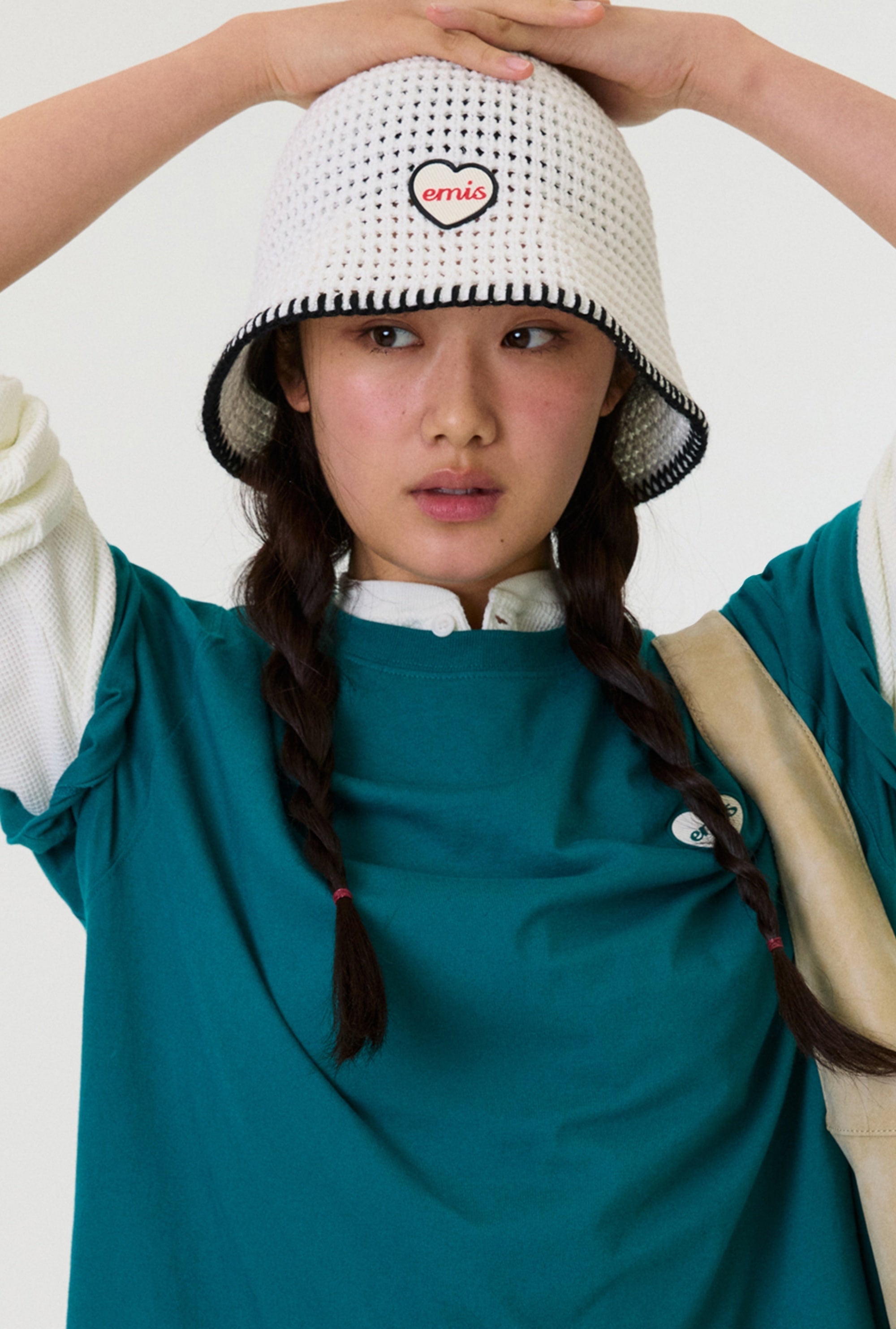 EMIS Heart Rubber Patch Knit Bucket Hat